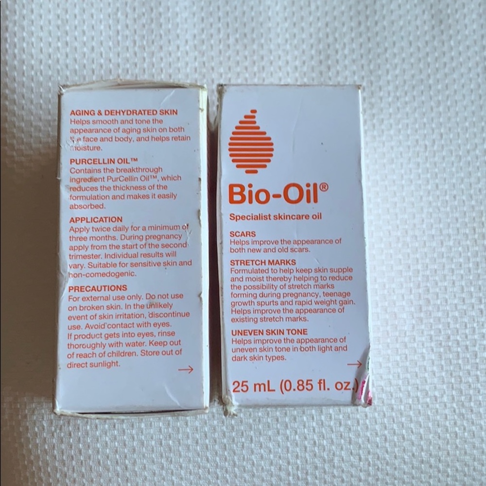Two bottles of Bio-oil sealed boxes
